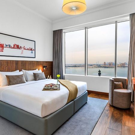 Somerset West Bay Doha Dış mekan fotoğraf A bedroom at the hotel